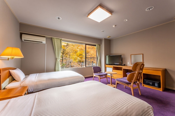 Imagen de la habitación del Hotel Kamenoi Nikko Yunishigawa. Foto 7