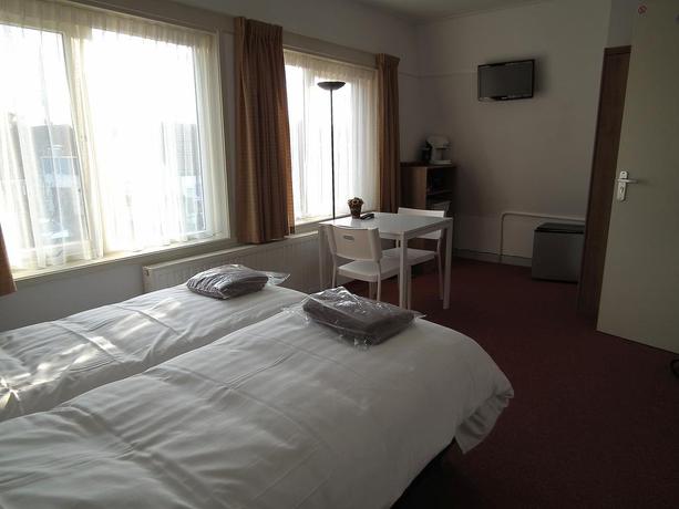 Imagen de la habitación del Hotel Kamerverhuur Mosselsymeer. Foto 4