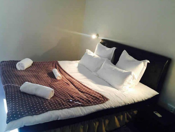 Imagen de la habitación del Hotel Kamho Pension. Foto 4