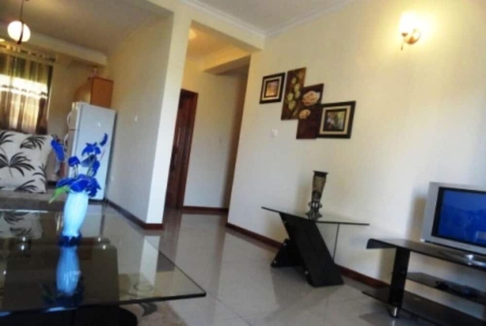 Imagen de la habitación del Hotel Kami Executive Apartments. Foto 12