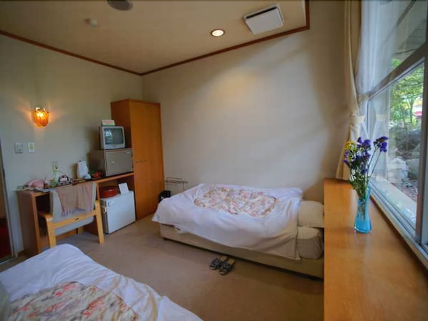 Imagen de la habitación del Hotel Kaminoyu Onsen. Foto 13