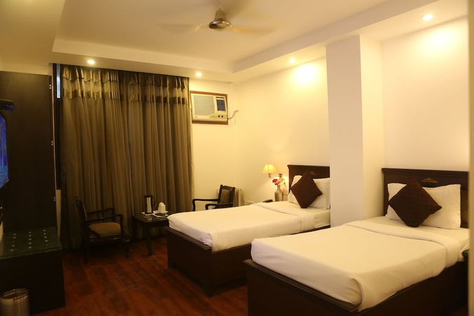 Imagen de la habitación del Hotel Kamla Palace. Foto 11