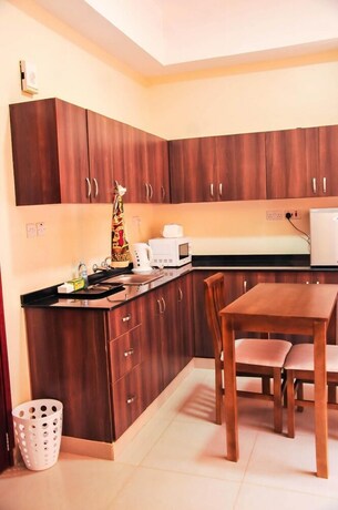 Imagen de la habitación del Hotel Kampala Suites. Foto 2