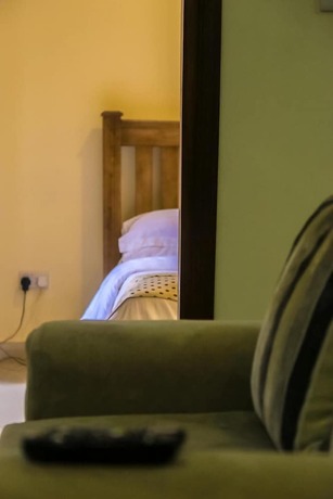 Imagen de la habitación del Hotel Kampala Suites. Foto 3