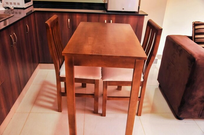 Imagen de la habitación del Hotel Kampala Suites. Foto 5