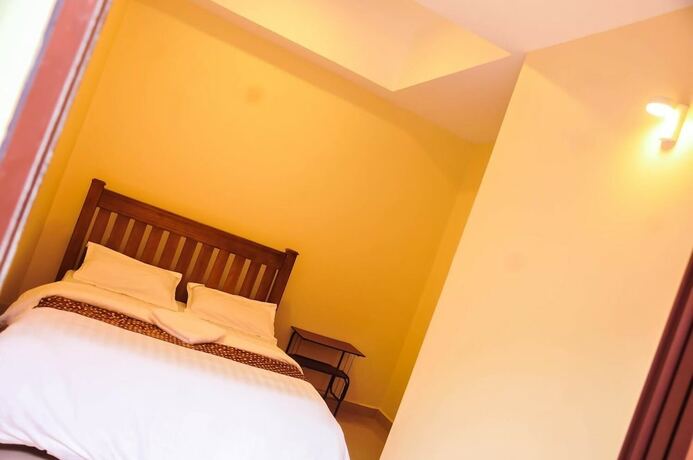 Imagen de la habitación del Hotel Kampala Suites. Foto 6