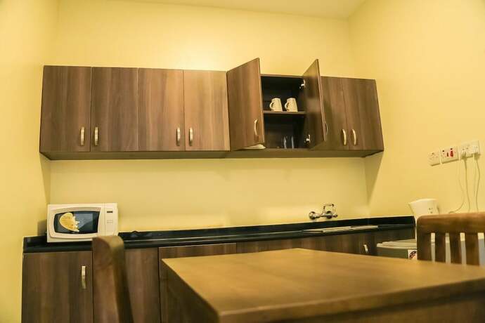 Imagen de la habitación del Hotel Kampala Suites. Foto 9