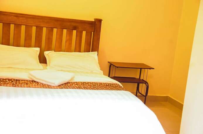 Imagen de la habitación del Hotel Kampala Suites. Foto 16