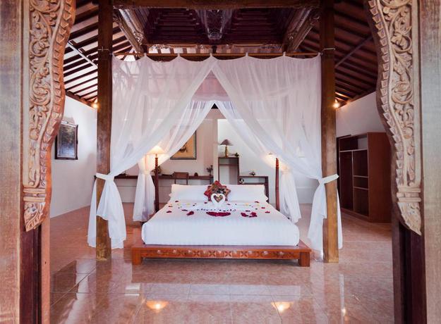 Imagen de la habitación del Hotel Kampoeng Joglo Abangan Villa Ubud. Foto 7