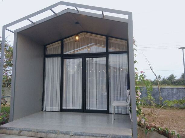 Imagen de la habitación del Hotel Kampot Tropical Village. Foto 16