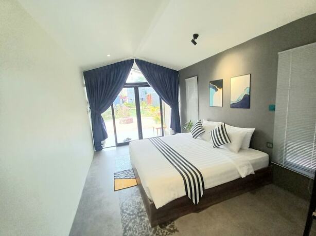 Imagen de la habitación del Hotel Kampot Tropical Village. Foto 17