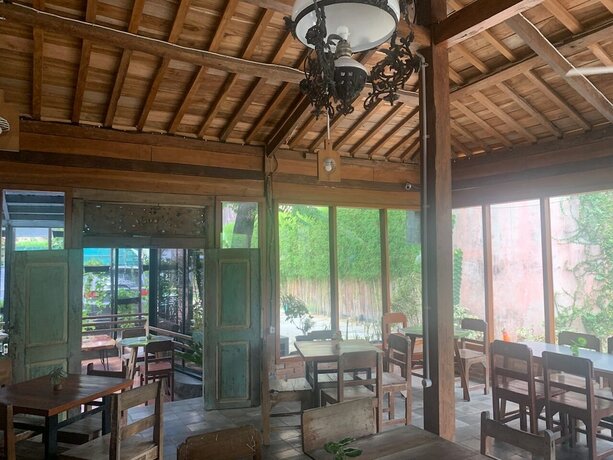Imagen del bar/restaurante del Hotel Kampung Lawasan Heritage Cottage. Foto 13
