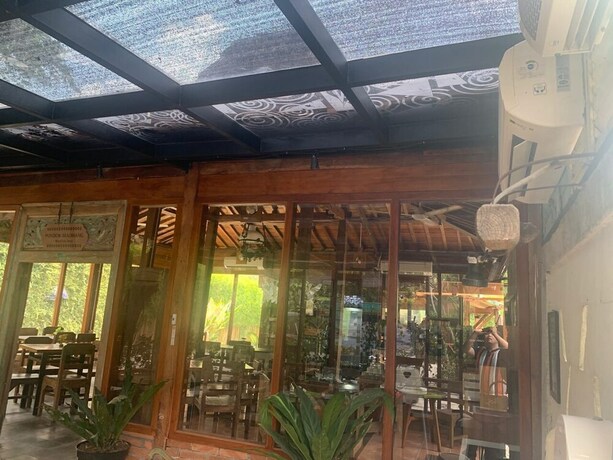 Imagen del bar/restaurante del Hotel Kampung Lawasan Heritage Cottage. Foto 15