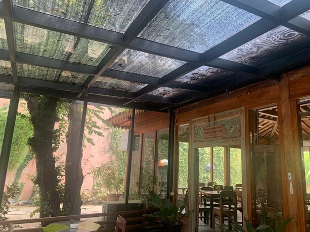 Imagen del bar/restaurante del Hotel Kampung Lawasan Heritage Cottage. Foto 17