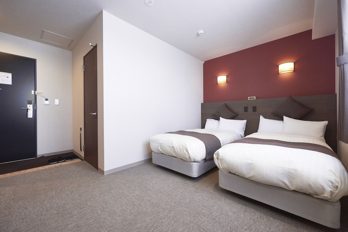 Imagen de la habitación del Hotel Kan - Raku Honjo Waseda Ekimae. Foto 4