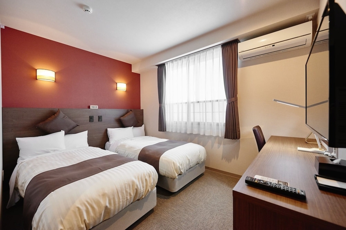 Imagen de la habitación del Hotel Kan - Raku Honjo Waseda Ekimae. Foto 5