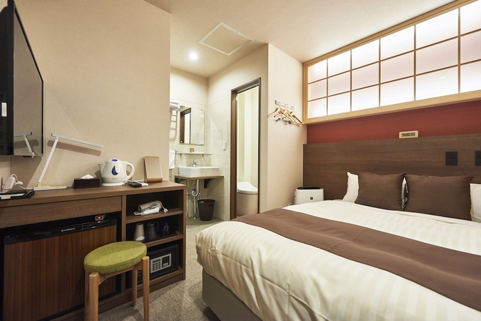 Imagen de la habitación del Hotel Kan - Raku Honjo Waseda Ekimae. Foto 7