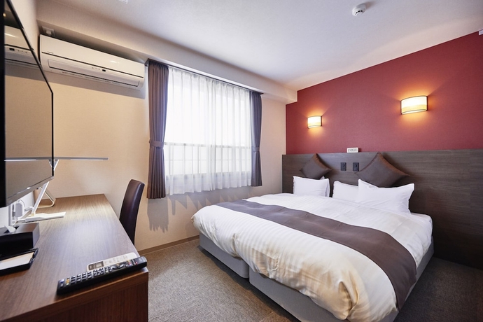 Imagen de la habitación del Hotel Kan - Raku Honjo Waseda Ekimae. Foto 14