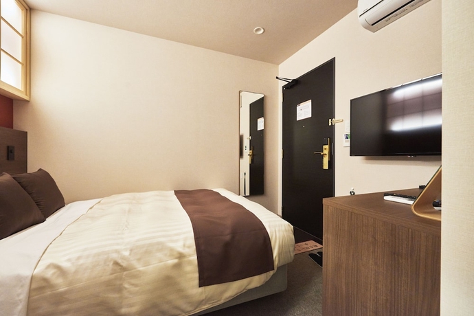 Imagen de la habitación del Hotel Kan - Raku Honjo Waseda Ekimae. Foto 15