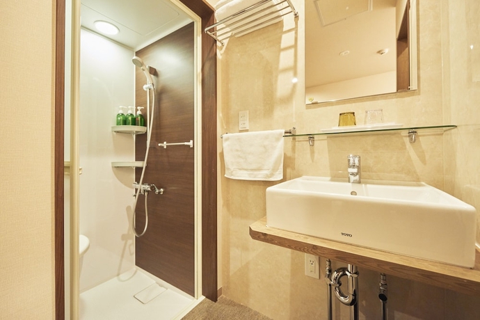 Imagen de la habitación del Hotel Kan - Raku Honjo Waseda Ekimae. Foto 16