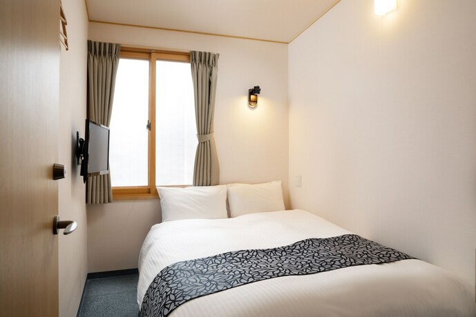 Imagen de la habitación del Hotel Kanade Kyotoekimae. Foto 16