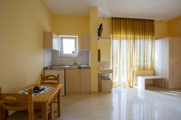 Imagen de la habitación del Hotel Kanali Village. Foto 14