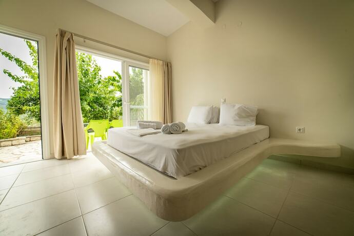 Imagen de la habitación del Hotel Kanali Village. Foto 15