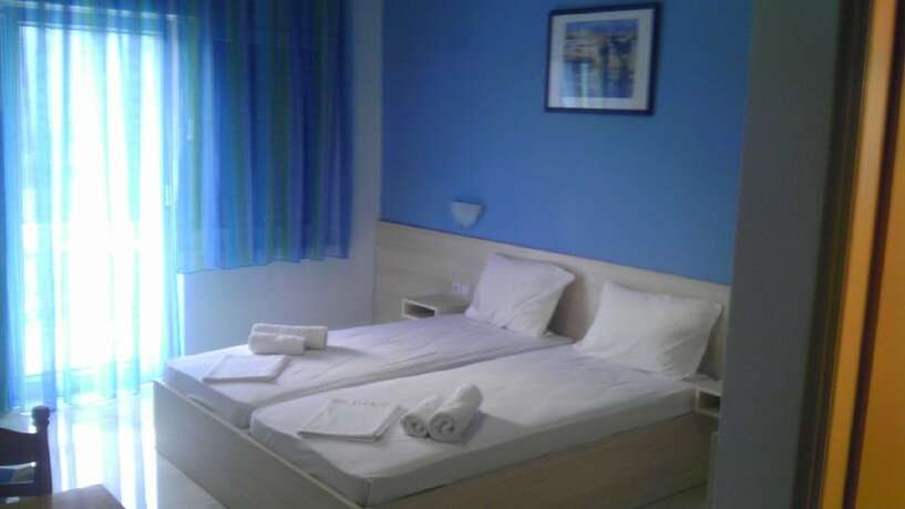 Imagen de la habitación del Hotel Kanali Village. Foto 16