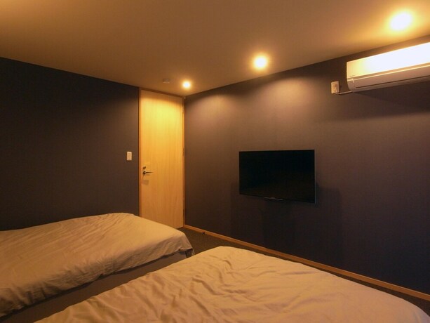 Imagen de la habitación del Hotel Kanazawa Tamaruya. Foto 24