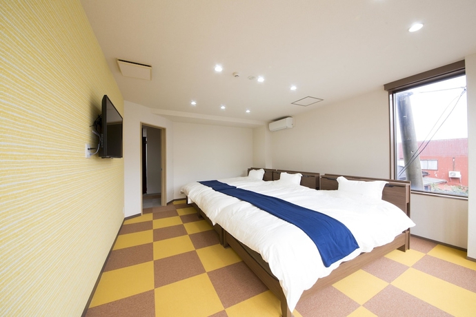 Imagen de la habitación del Hotel Kanazawaya. Foto 9