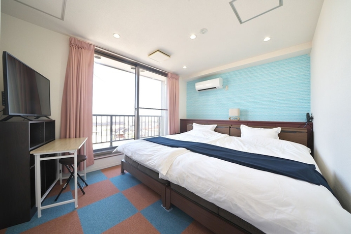 Imagen de la habitación del Hotel Kanazawaya. Foto 11