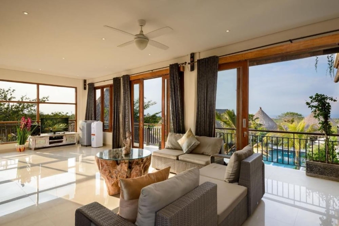 Imagen de la habitación del Hotel Kandahill Bali. Foto 3