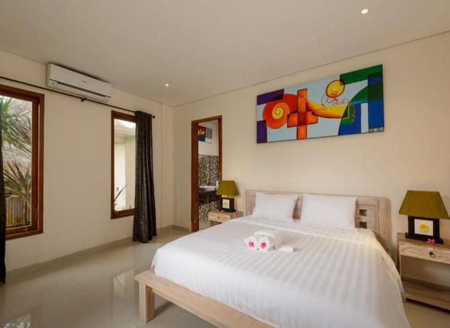 Imagen de la habitación del Hotel Kandahill Bali. Foto 4