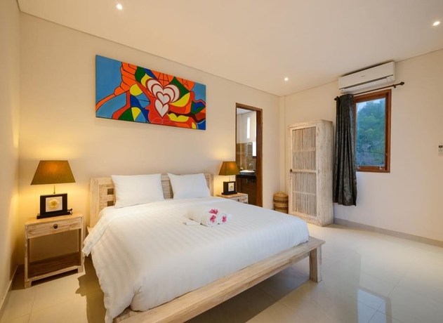 Imagen de la habitación del Hotel Kandahill Bali. Foto 5