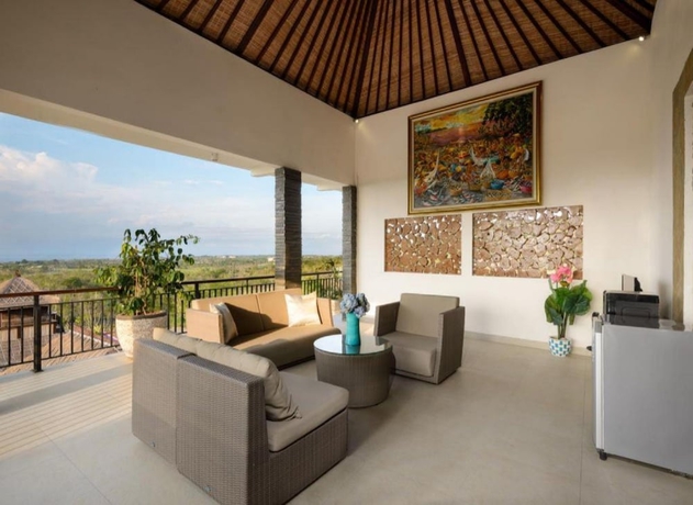 Imagen de la habitación del Hotel Kandahill Bali. Foto 9