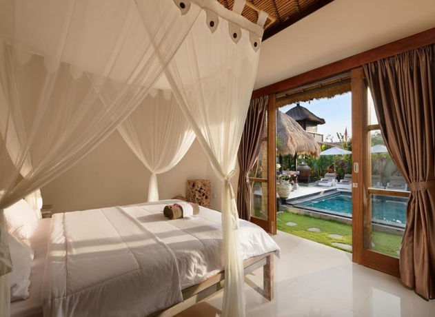 Imagen de la habitación del Hotel Kandahill Bali. Foto 10