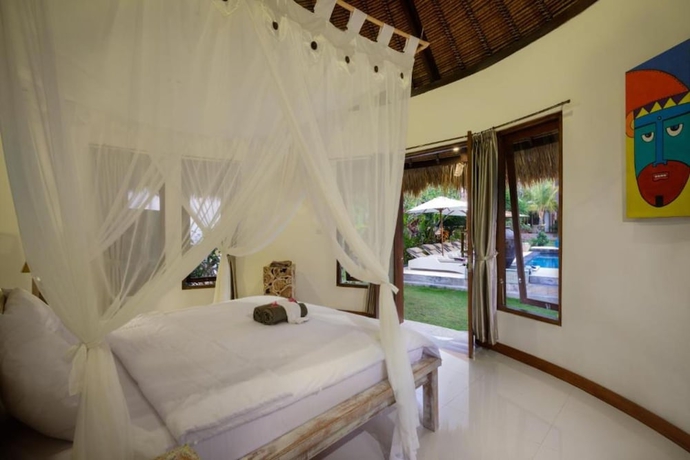 Imagen de la habitación del Hotel Kandahill Bali. Foto 11