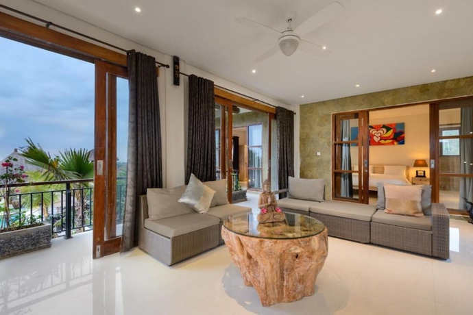 Imagen de la habitación del Hotel Kandahill Bali. Foto 12