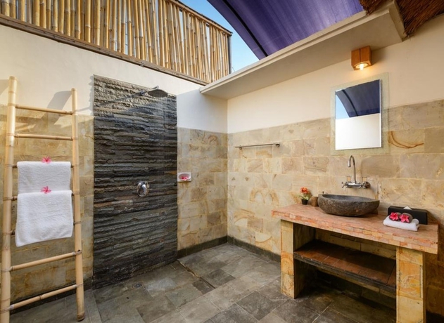 Imagen de la habitación del Hotel Kandahill Bali. Foto 13