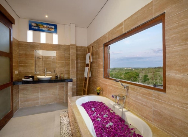 Imagen de la habitación del Hotel Kandahill Bali. Foto 14
