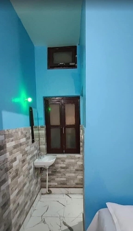 Imagen de la habitación del Hotel Kandari Guest House. Foto 6