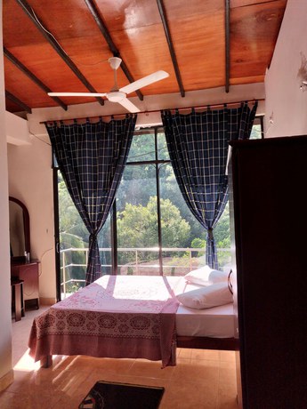 Imagen de la habitación del Hotel Kandy View. Foto 2