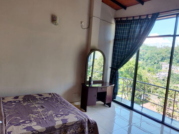 Imagen de la habitación del Hotel Kandy View. Foto 11