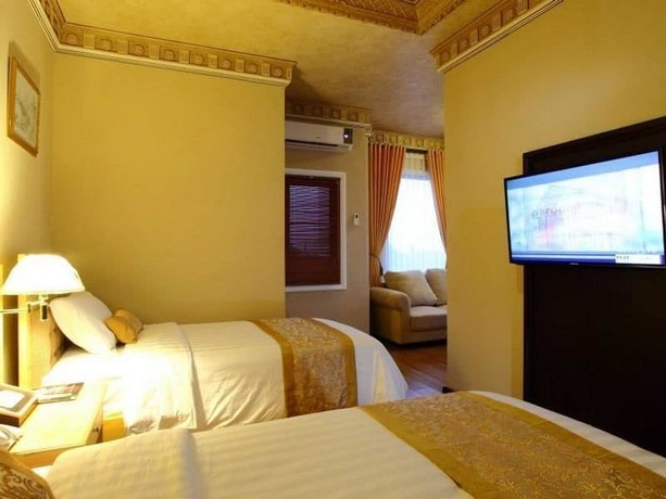 Imagen de la habitación del Hotel Kangen Boutique. Foto 12