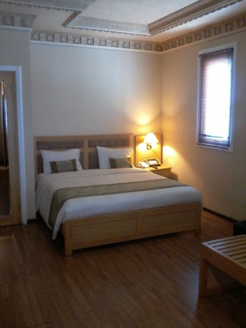 Imagen de la habitación del Hotel Kangen Boutique. Foto 15
