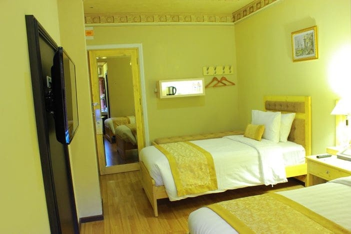 Imagen de la habitación del Hotel Kangen Boutique. Foto 17