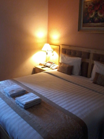 Imagen de la habitación del Hotel Kangen Boutique. Foto 18