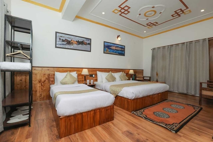 Imagen de la habitación del Hotel Kangseng House. Foto 2