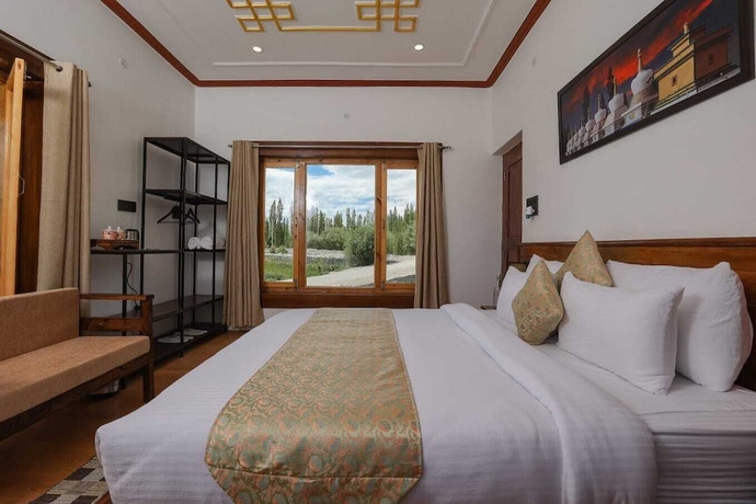Imagen de la habitación del Hotel Kangseng House. Foto 12