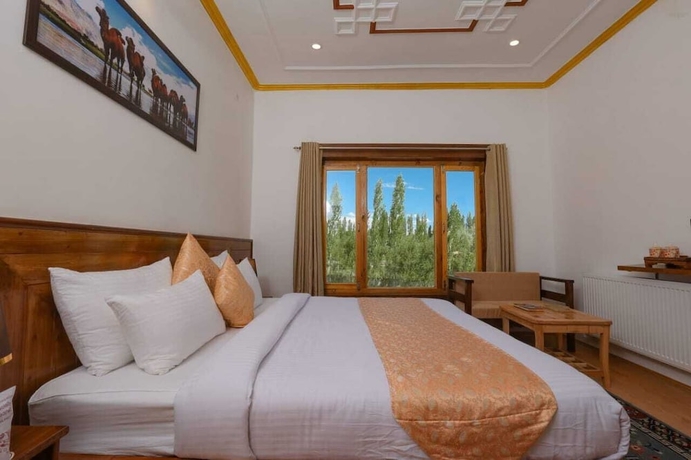 Imagen de la habitación del Hotel Kangseng House. Foto 13